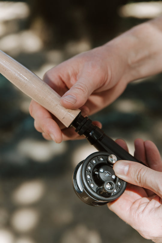 man holding honeyhole reel